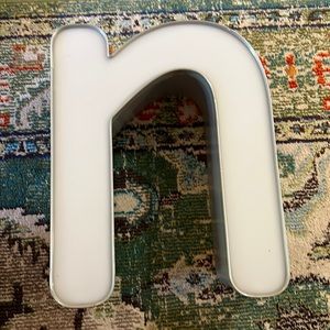 Letter N from vintage signage sign lowercase n or u